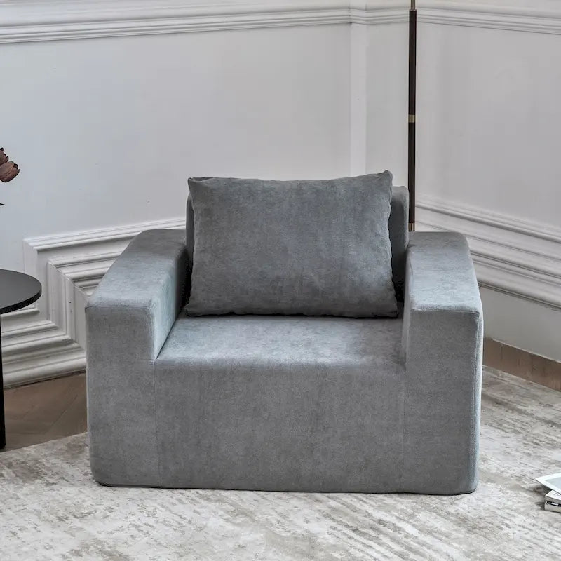 Fauteuil d'appoint uni gris en mousse avec coussin