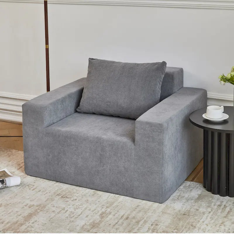 Fauteuil d'appoint uni gris en mousse avec coussin