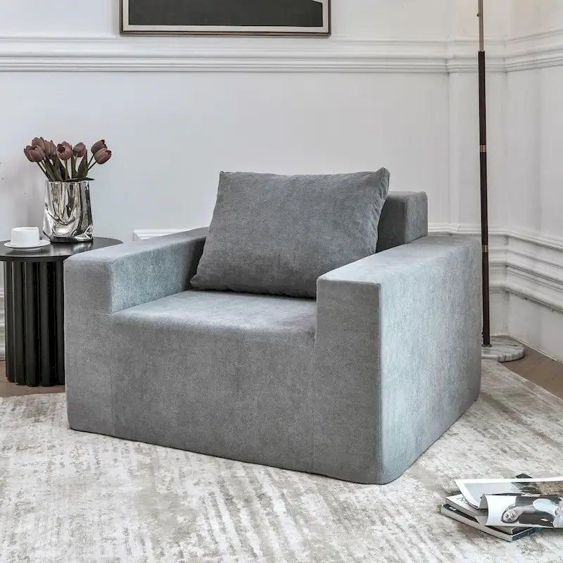 Poltroncina decorativa in schiuma grigia semplice con cuscino