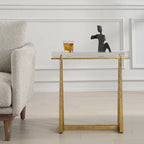 Table d'appoint finition dorée avec plateau en verre