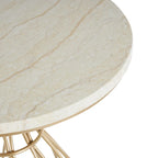Table d’appoint dorée inspirée d’une fleur avec plateau en marbre crème